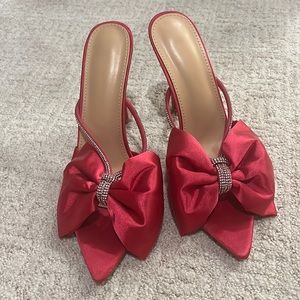 Hot pink rhinestone heels. Not sure the brand